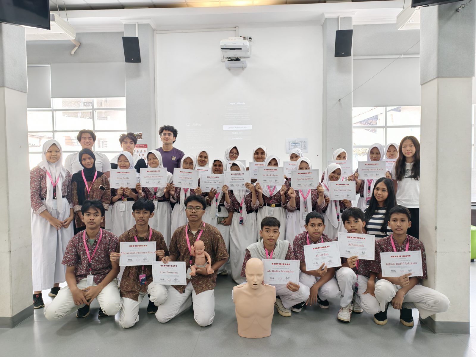 A workshop group holding certificates after a Beatkeepers session